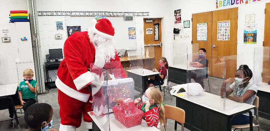Santa delivers presents at GYAC Student Christmas Party